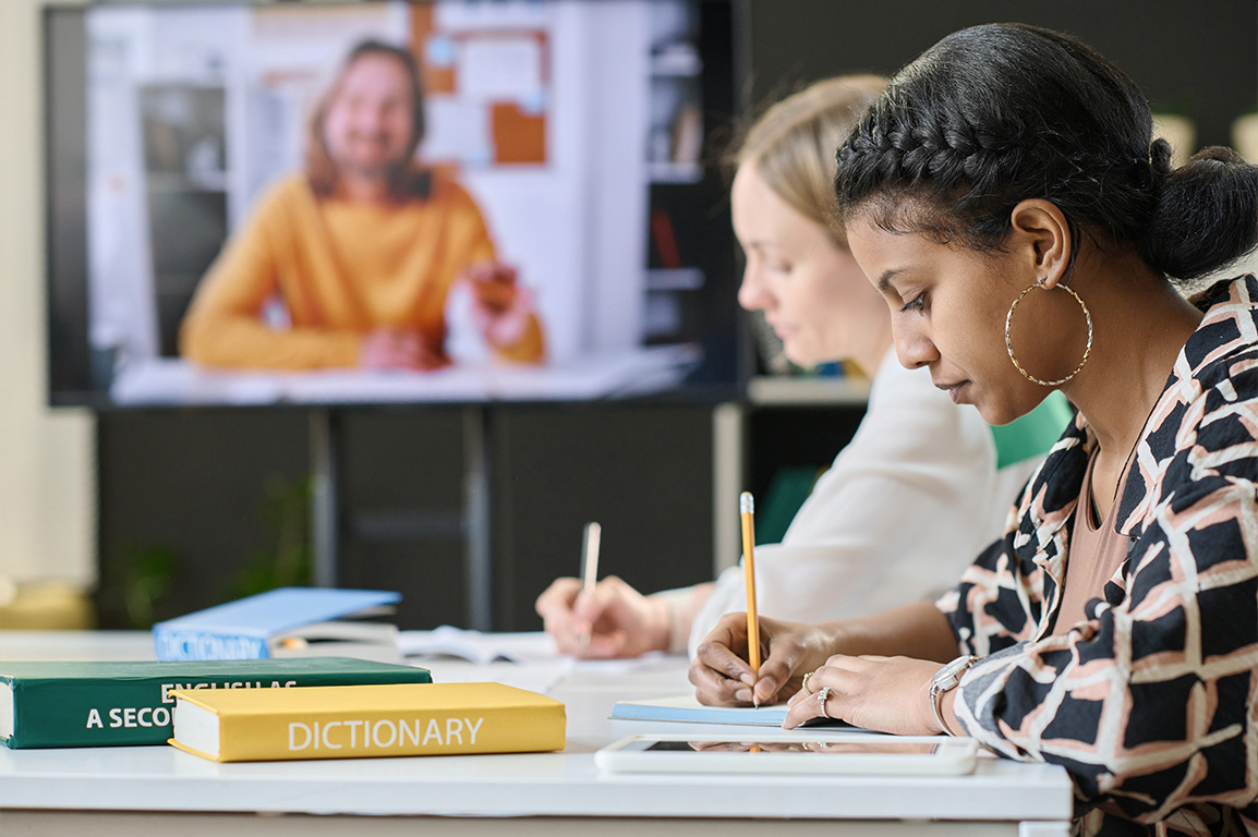 Image of a person reading a book with the text 'Continuous Learning: Unlock Your Potential